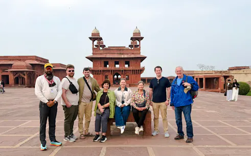 Group of tourists at Agra Fort during a 2-day private trip from Delhi.
