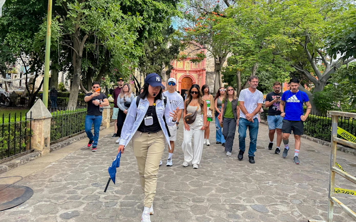 Tour group exploring Cuernavaca with a guide, Mexico City: Cuernavaca & Taxco Day Tour.