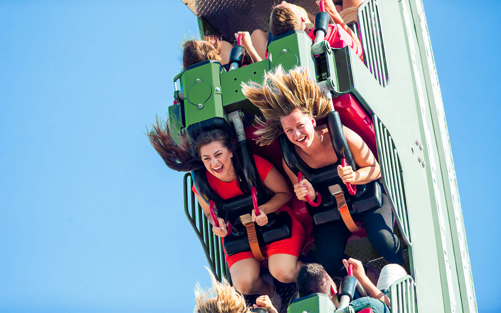 Riders enjoying the Rolling Thunder ride at Six Flags Darien Lake.