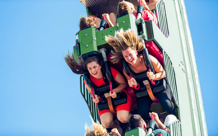 Riders enjoying the Rolling Thunder ride at Six Flags Darien Lake.