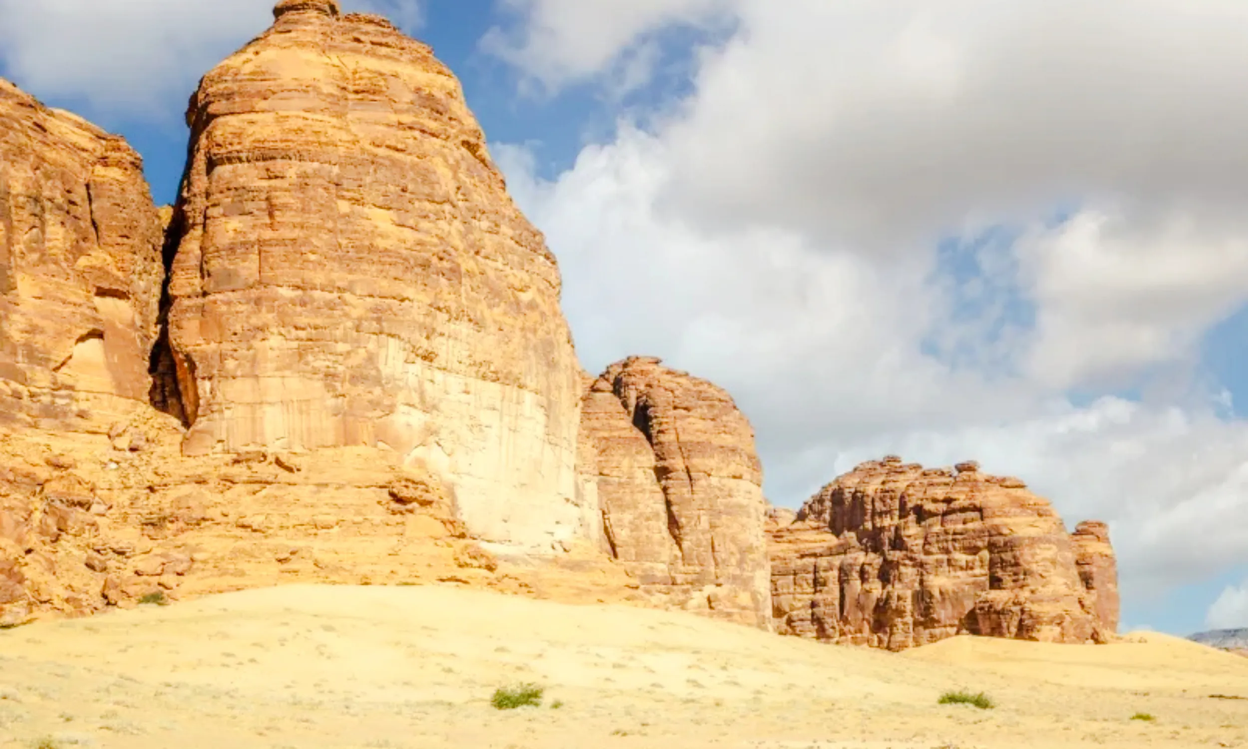 Rock formations in AlUla desert landscape, part of a private 2-day tour from Madinah.