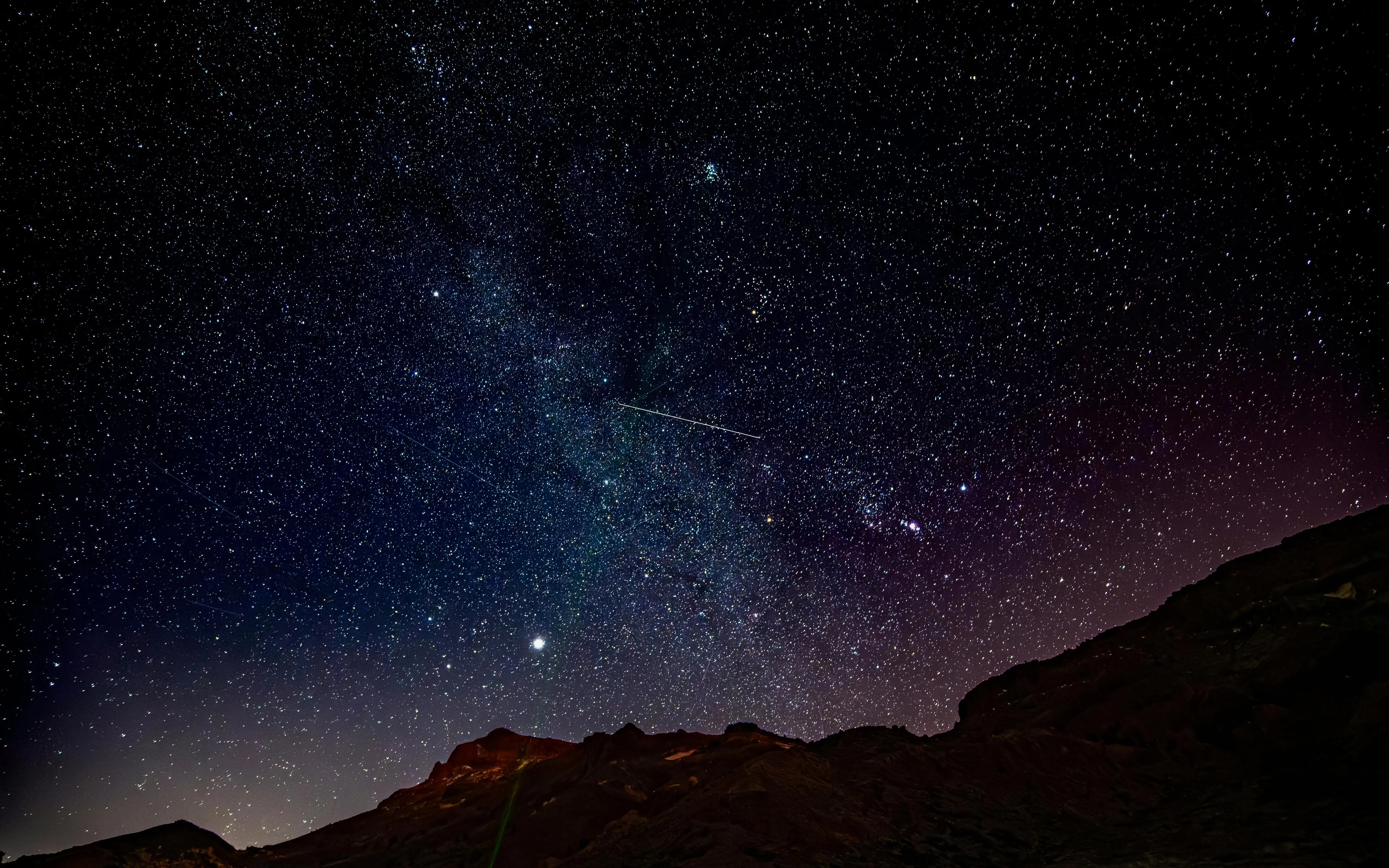 Starry night sky over Mount Teide in Tenerife, viewed from the National Park.