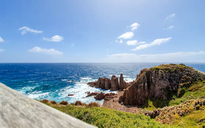 Phillip Island coastline with rocky cliffs and ocean view.