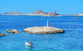 Sailboat near Frioul Archipelago with Châteaux d’If in the background, Marseille.
