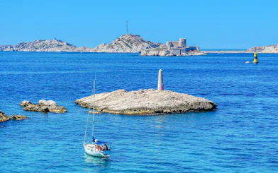 Sailboat near Frioul Archipelago with Châteaux d’If in the background, Marseille.