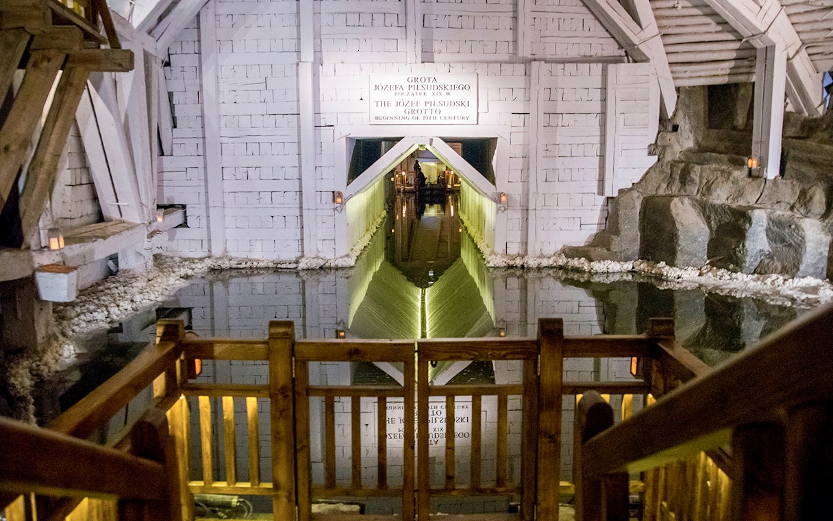 Wieliczka Salt Mine's Józef Piłsudski Grotto with reflective water, Krakow tour.