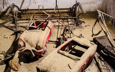 Old cars covered in dust in Naples Underground.