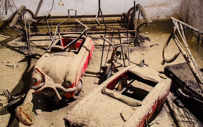 Old cars covered in dust in Naples Underground.