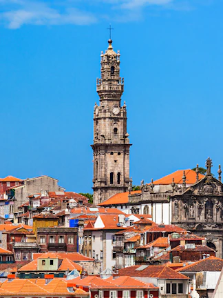 Clerigos Tower in Porto with cityscape view in the background.