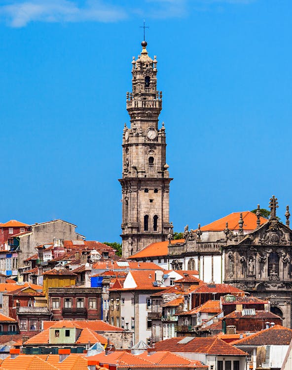 Clerigos Tower in Porto with cityscape view in the background.