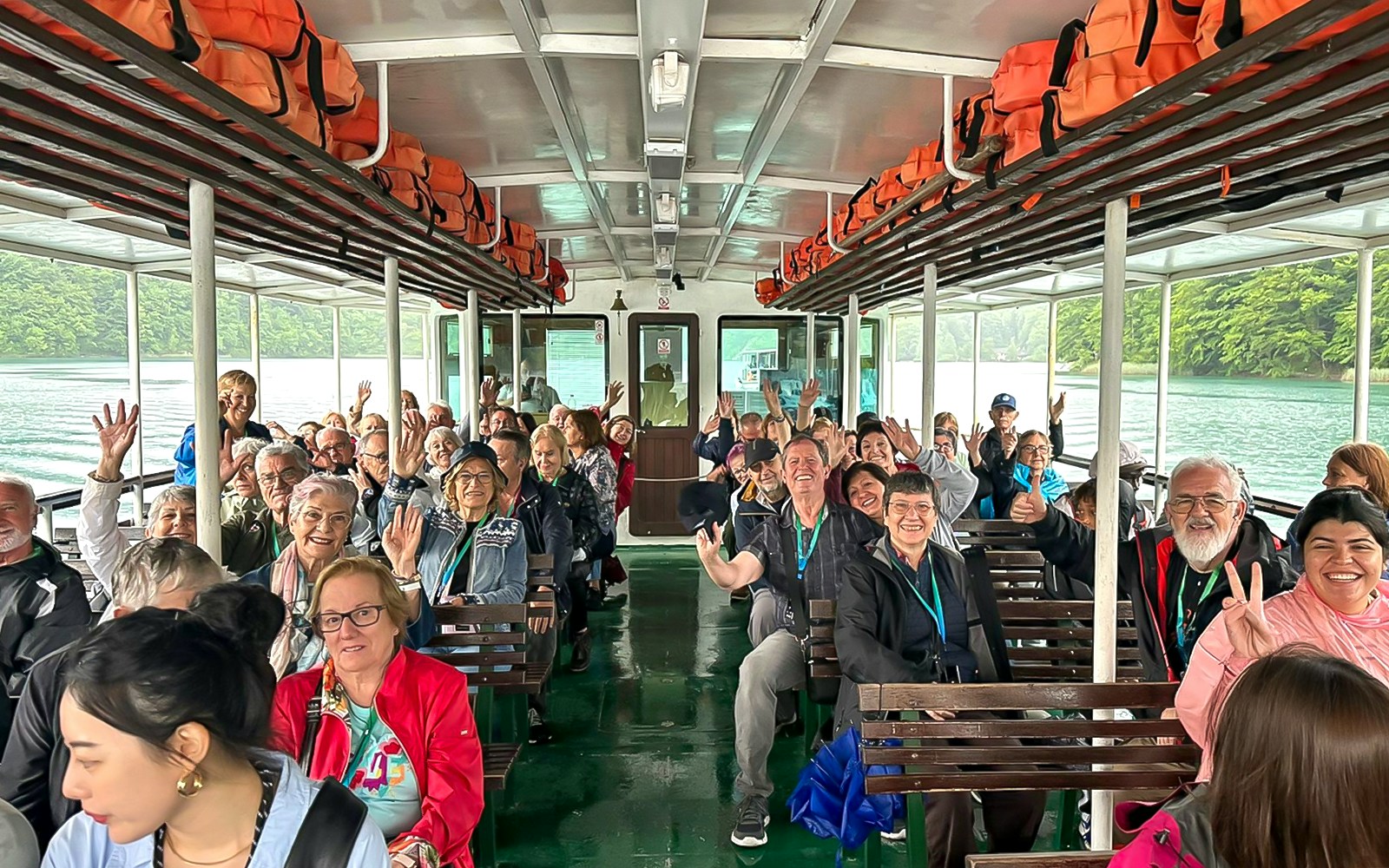 Guests on a boat during Plitvice Lakes Tour, Croatia, enjoying the scenic ride.