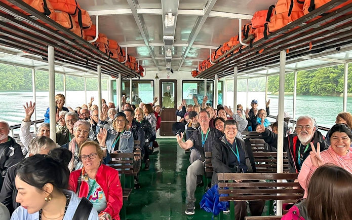 Guests on a boat during Plitvice Lakes Tour, Croatia, enjoying the scenic ride.