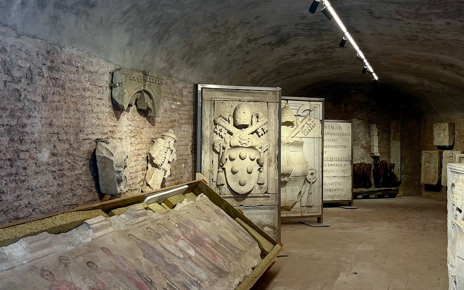 Armor and stone carvings inside Castel Sant'Angelo, Rome.