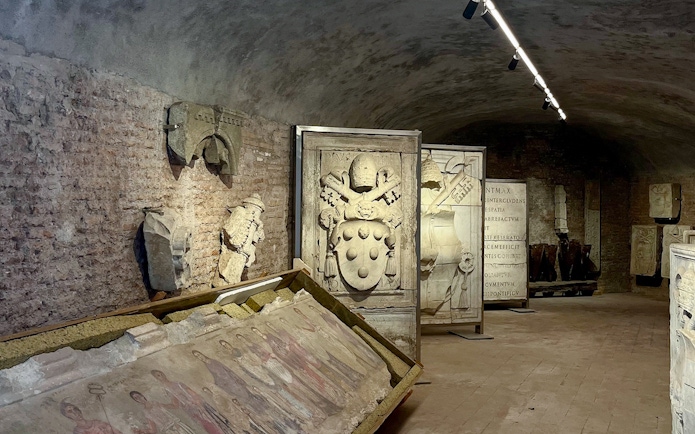 Armor and stone carvings inside Castel Sant'Angelo, Rome.