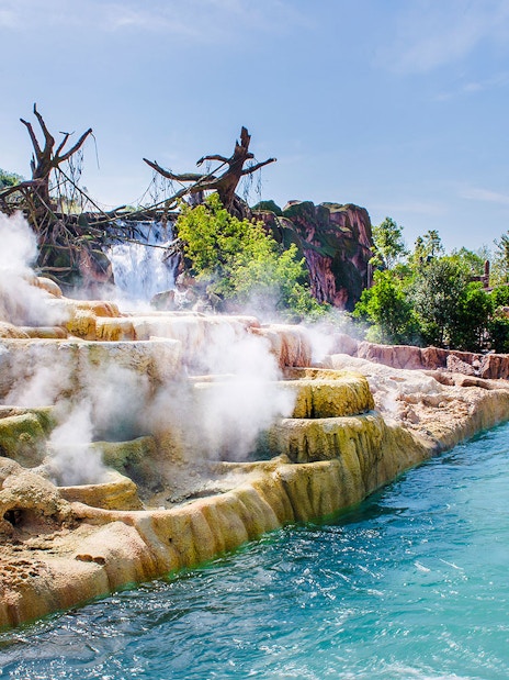 Steaming rock formations and water ride at Shanghai Disney.