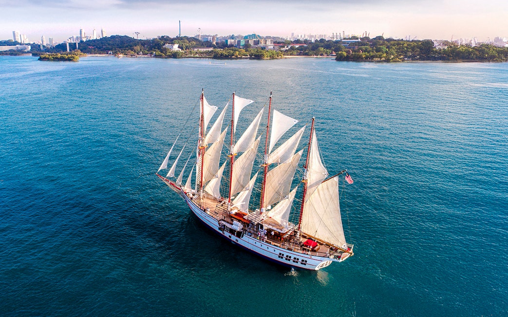 Sailing ship Royal Albatross on a sunset dinner cruise near Singapore coast.