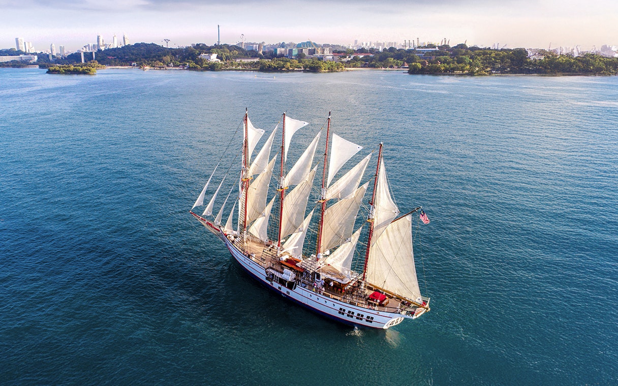 Sailing ship Royal Albatross on a sunset dinner cruise near Singapore coast.