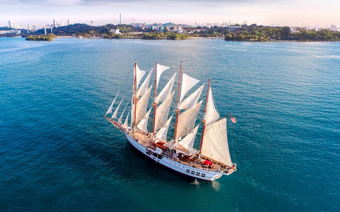 Sailing ship Royal Albatross on a sunset dinner cruise near Singapore coast.