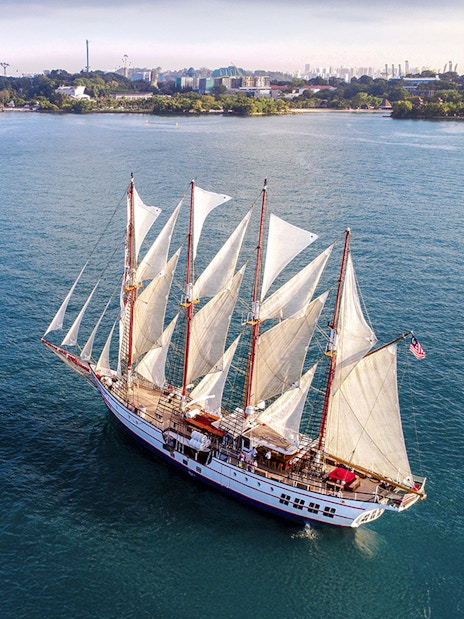 Sailing ship Royal Albatross on a sunset dinner cruise near Singapore coast.