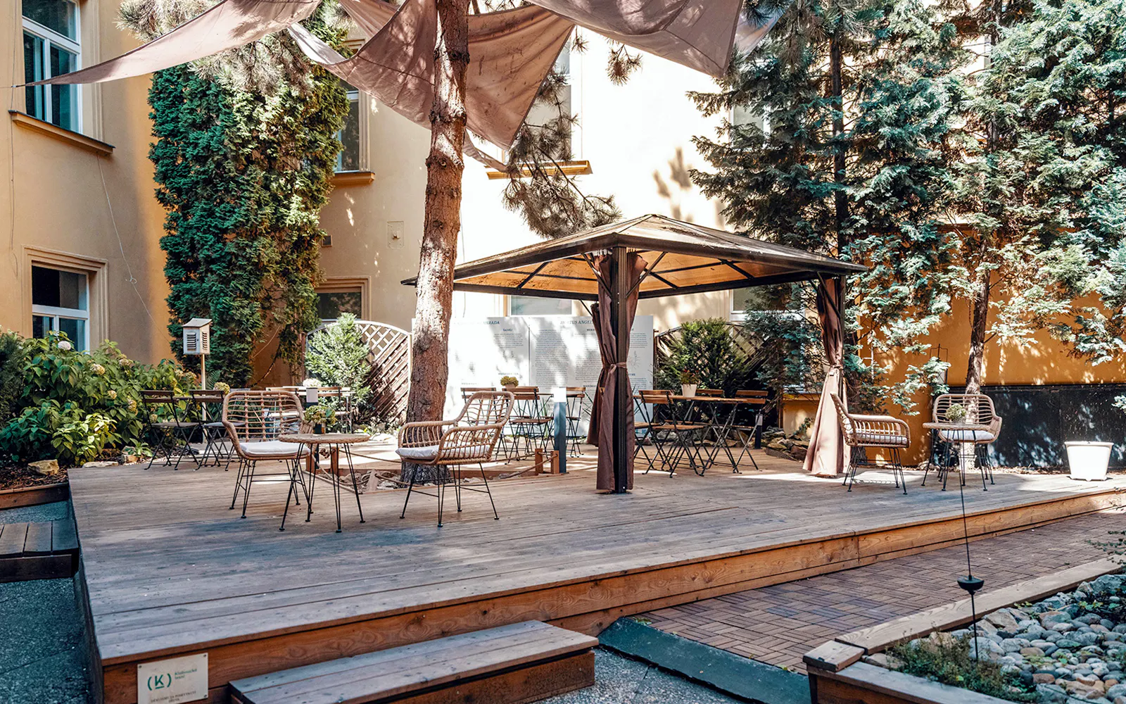 Courtyard seating area inside Minorite monastery of St James, Prague.
