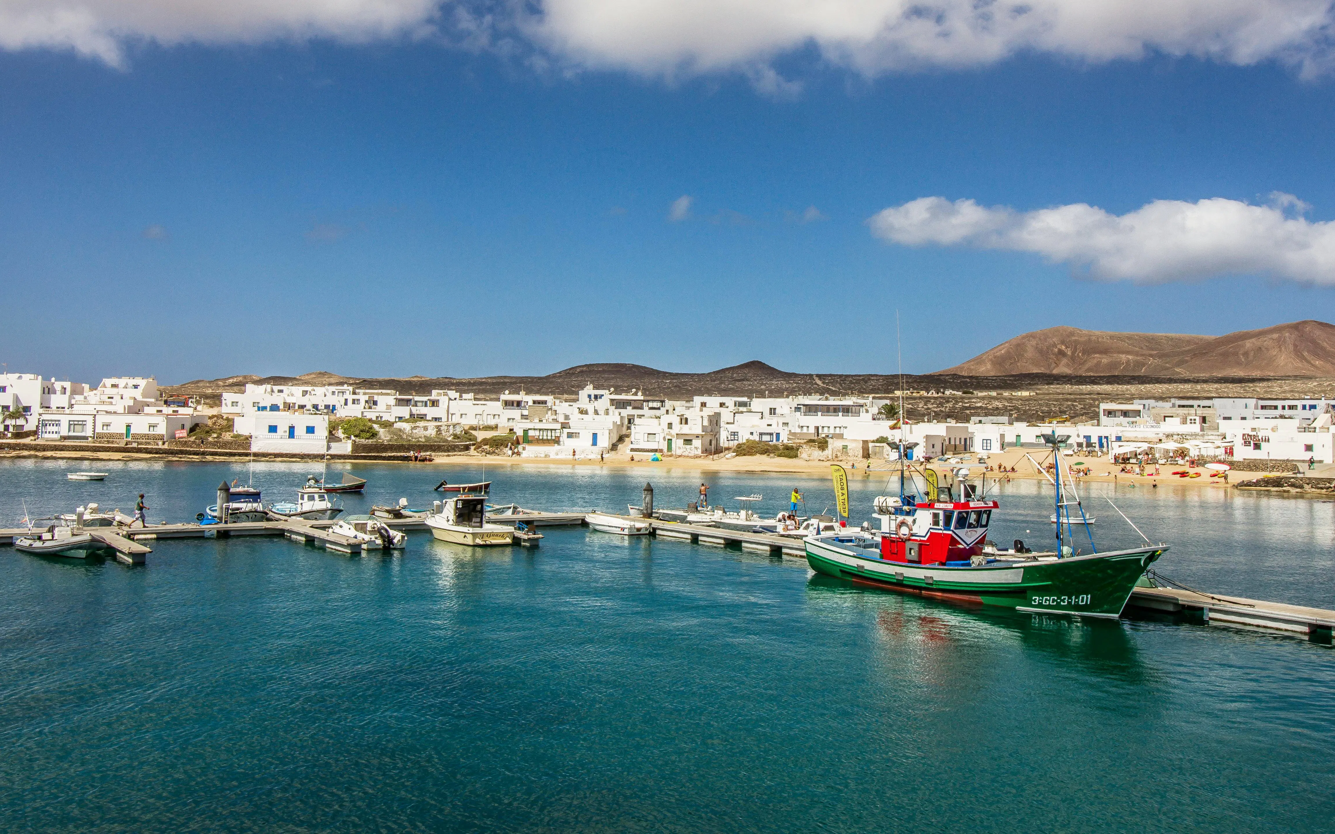 Boats docked at the port of Caleta de Sebo on La Graciosa island, Canary Islands, Spain.