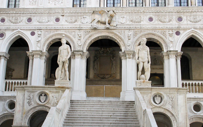 Staircase with statues at Doge's Palace, Venice, Italy.