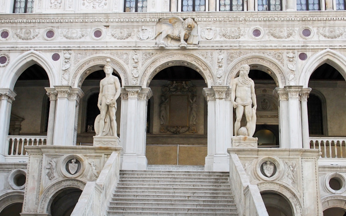 Staircase with statues at Doge's Palace, Venice, Italy.