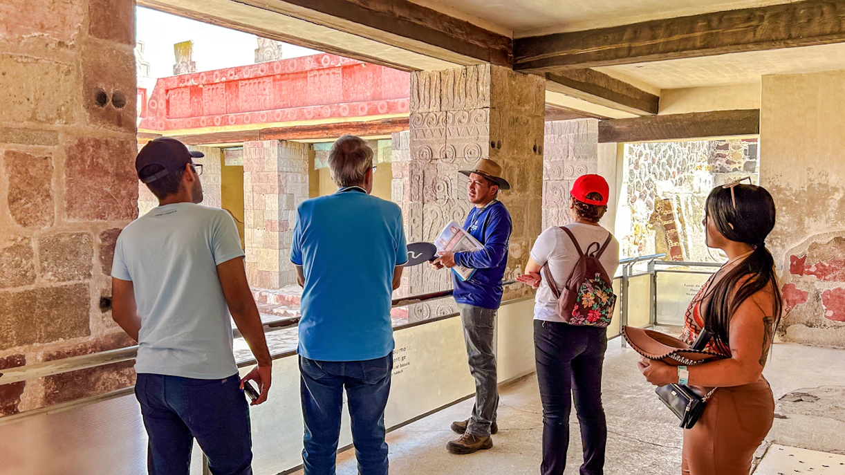 Teotihuacan pyramids with tourists exploring ancient ruins in Mexico.