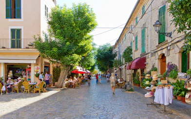 Valldemossa street with cafes and shops, part of the Valldemossa and Soller Tour.