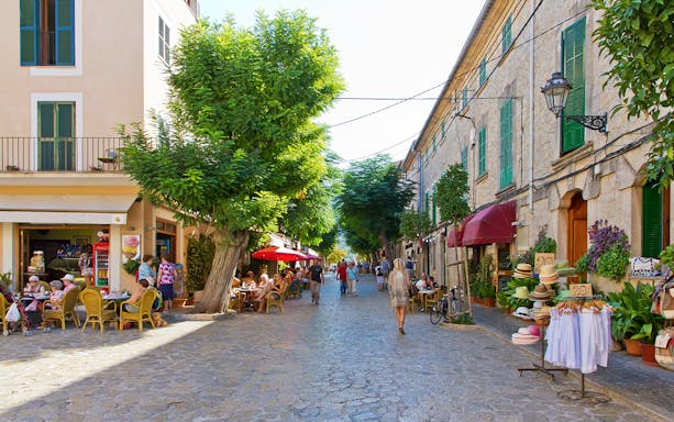 Valldemossa street with cafes and shops, part of the Valldemossa and Soller Tour.
