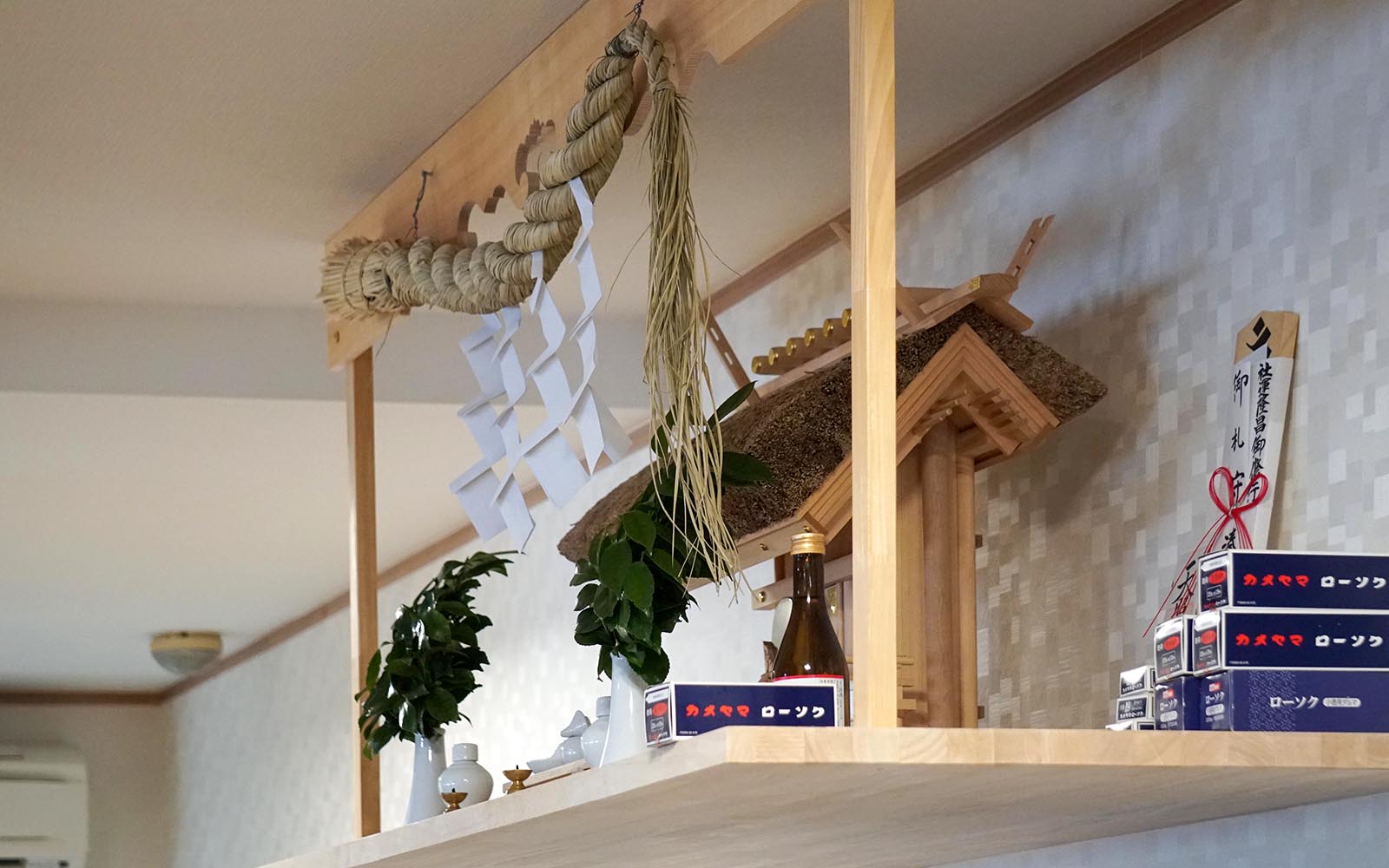 Sumo stable altar with traditional decorations and offerings in Japan.