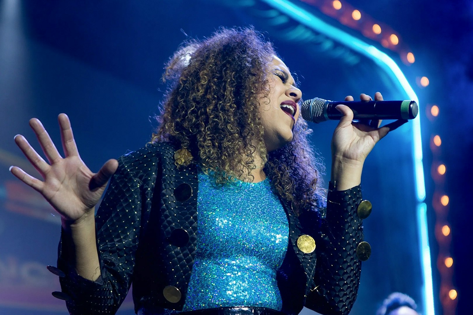 Singer performing at The Jets: Back to the 80's & 90's Experience concert.