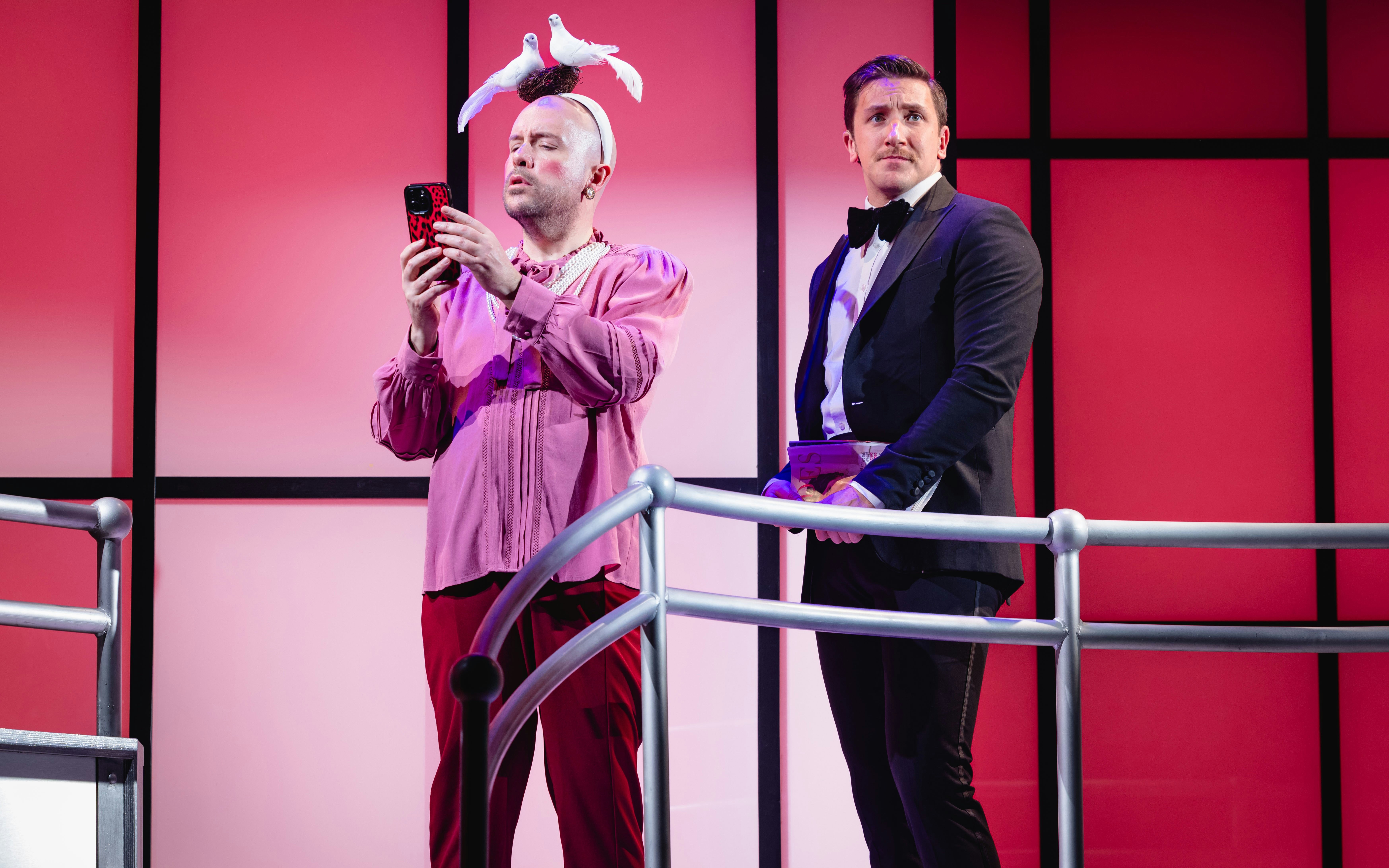 Stage performance of Titanique Westend with two actors on a ship's deck.