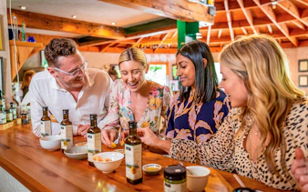 Group tasting olive oil at Allpress Olive Groves.