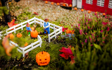Lego figures with pumpkins in a Halloween display at Legoland Billund.