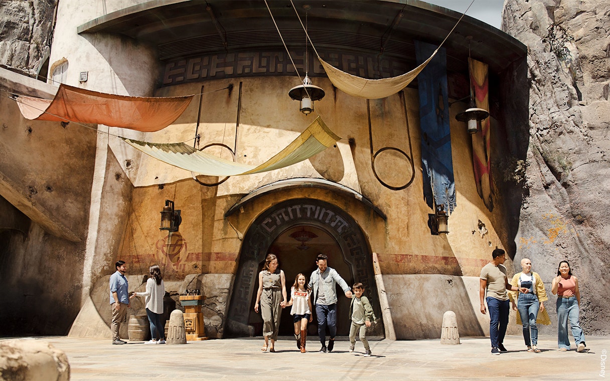 Visitors walking through Star Wars attraction at Disneyland Park, California.