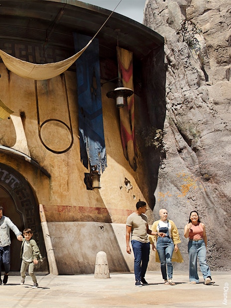 Visitors walking through Star Wars attraction at Disneyland Park, California.