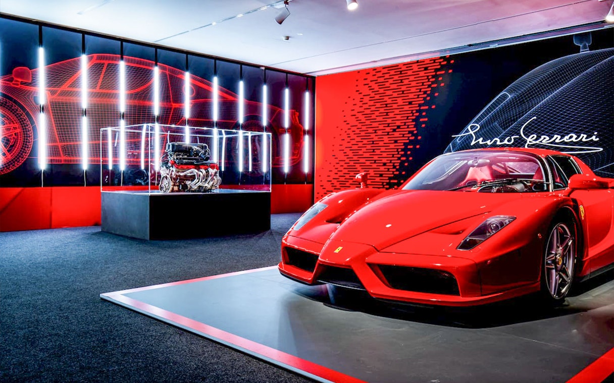 Ferrari car and engine display at Ferrari Museum, Maranello.