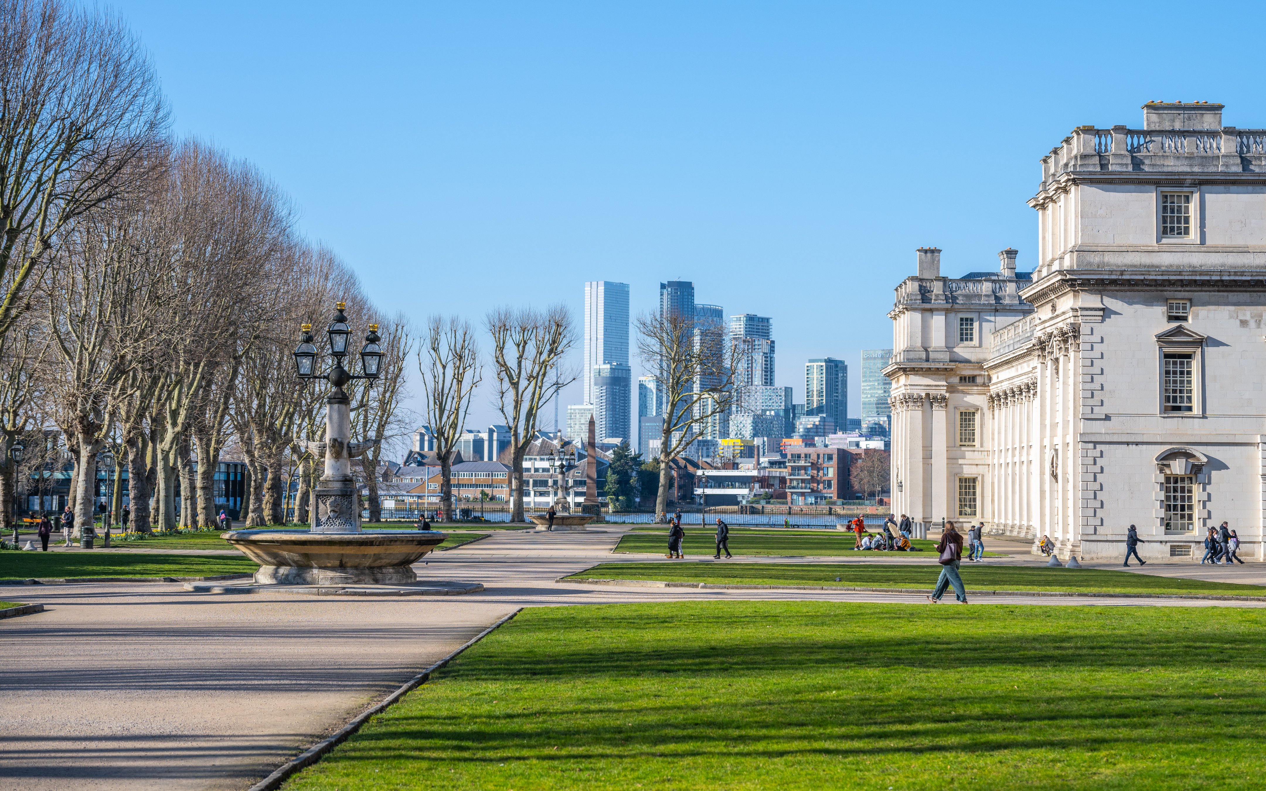 Greenwich Promenade in Berlin with historic architecture and city skyline in the background.