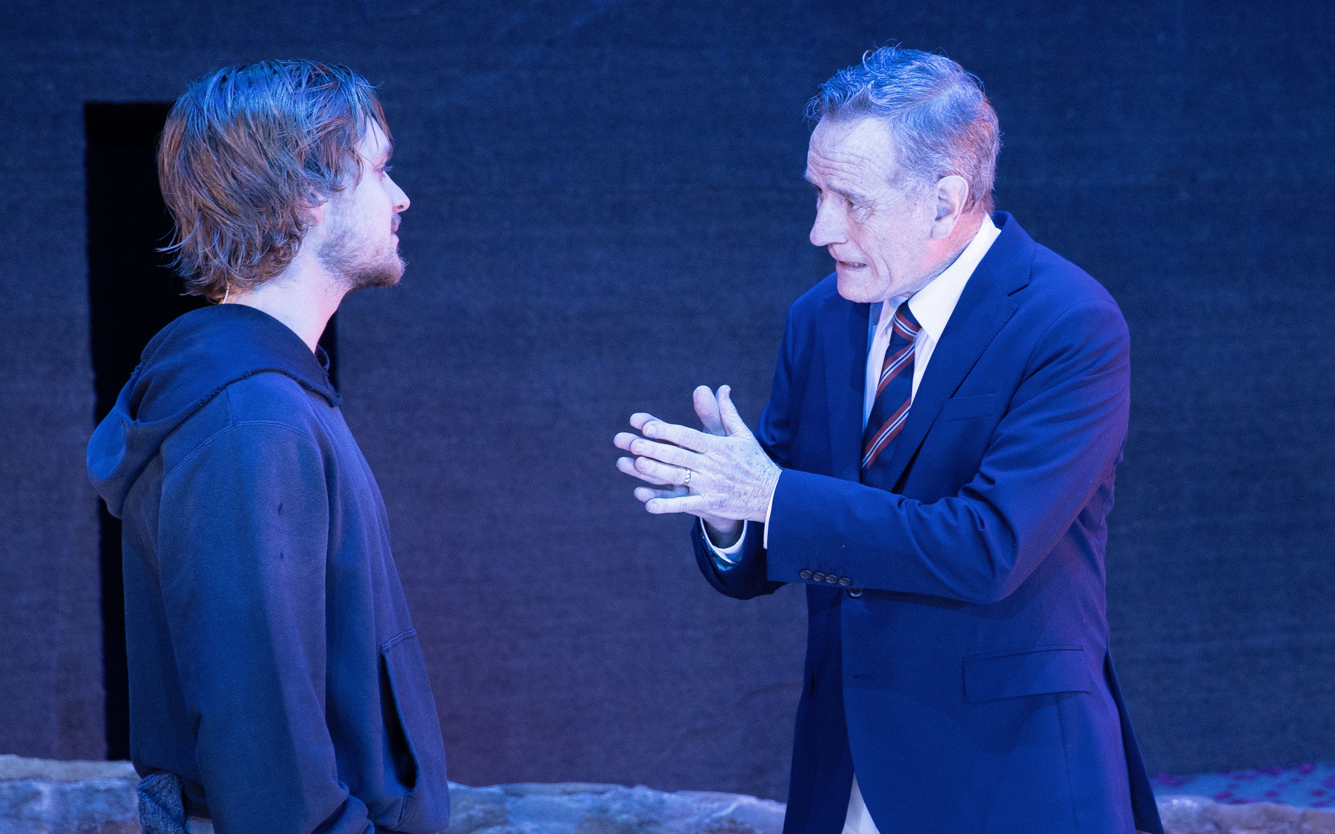 Actors in a scene from the West End show "All My Sons" performing on stage.