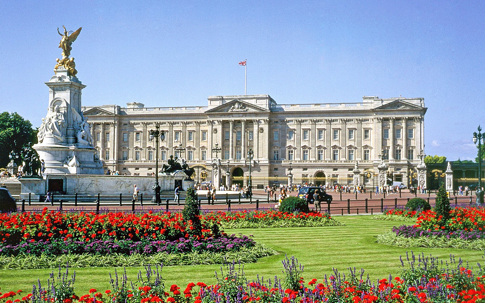 Buckingham Palace with Victoria Memorial and gardens in London.
