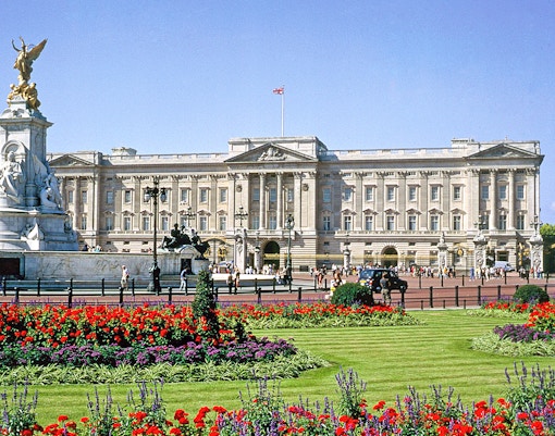 Buckingham Palace with Victoria Memorial and gardens in London.