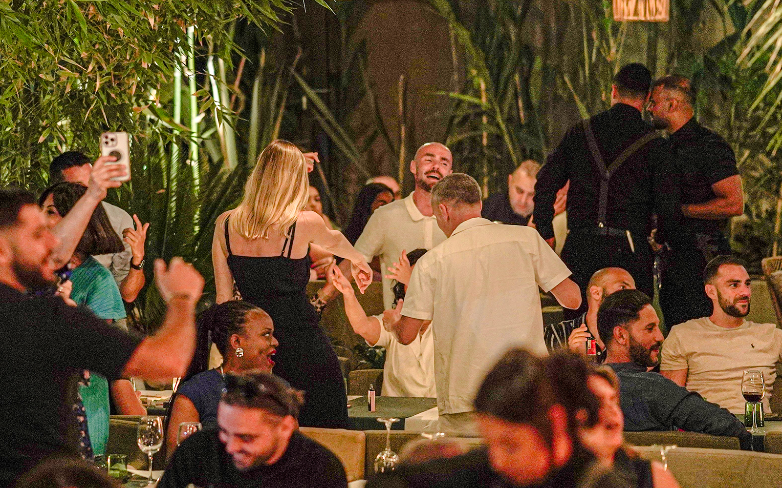 Guests enjoying a lively evening at Nouba Restaurant Dinner Show.