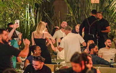 Guests enjoying a lively evening at Nouba Restaurant Dinner Show.