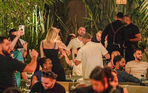 Guests enjoying a lively evening at Nouba Restaurant Dinner Show.