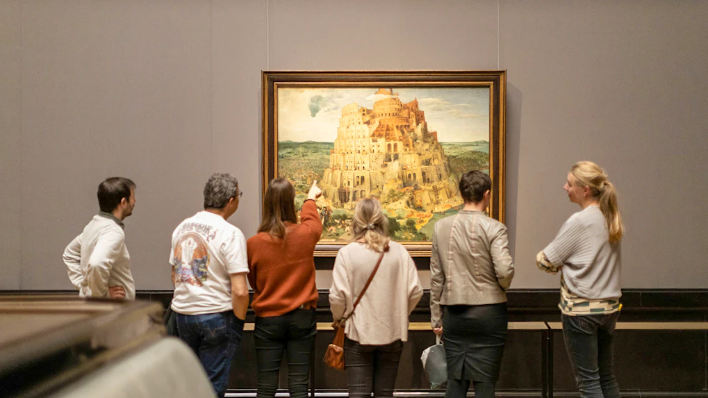 Guests viewing The Tower of Babel by Pieter Bruegel at Kunsthistorisches Museum Vienna.