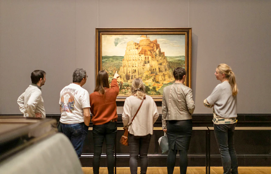 Guests viewing The Tower of Babel by Pieter Bruegel at Kunsthistorisches Museum Vienna.