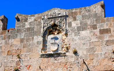 Stone carvings on the wall of the Palace of the Grand Master of the Knights of Rhodes.