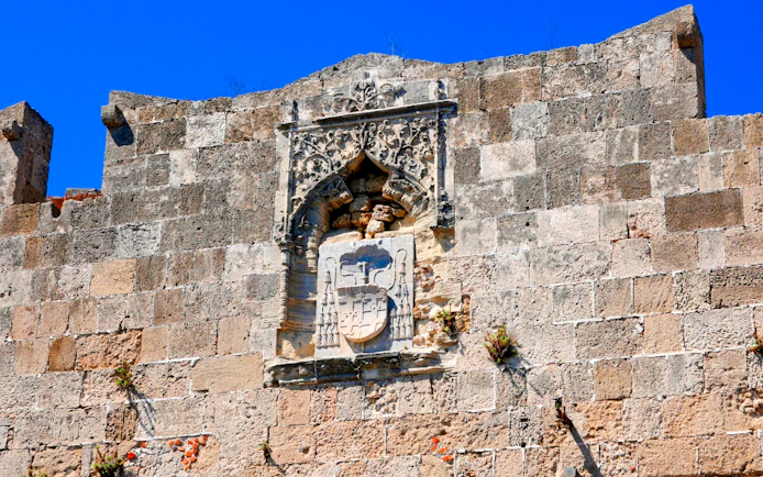 Stone carvings on the wall of the Palace of the Grand Master of the Knights of Rhodes.