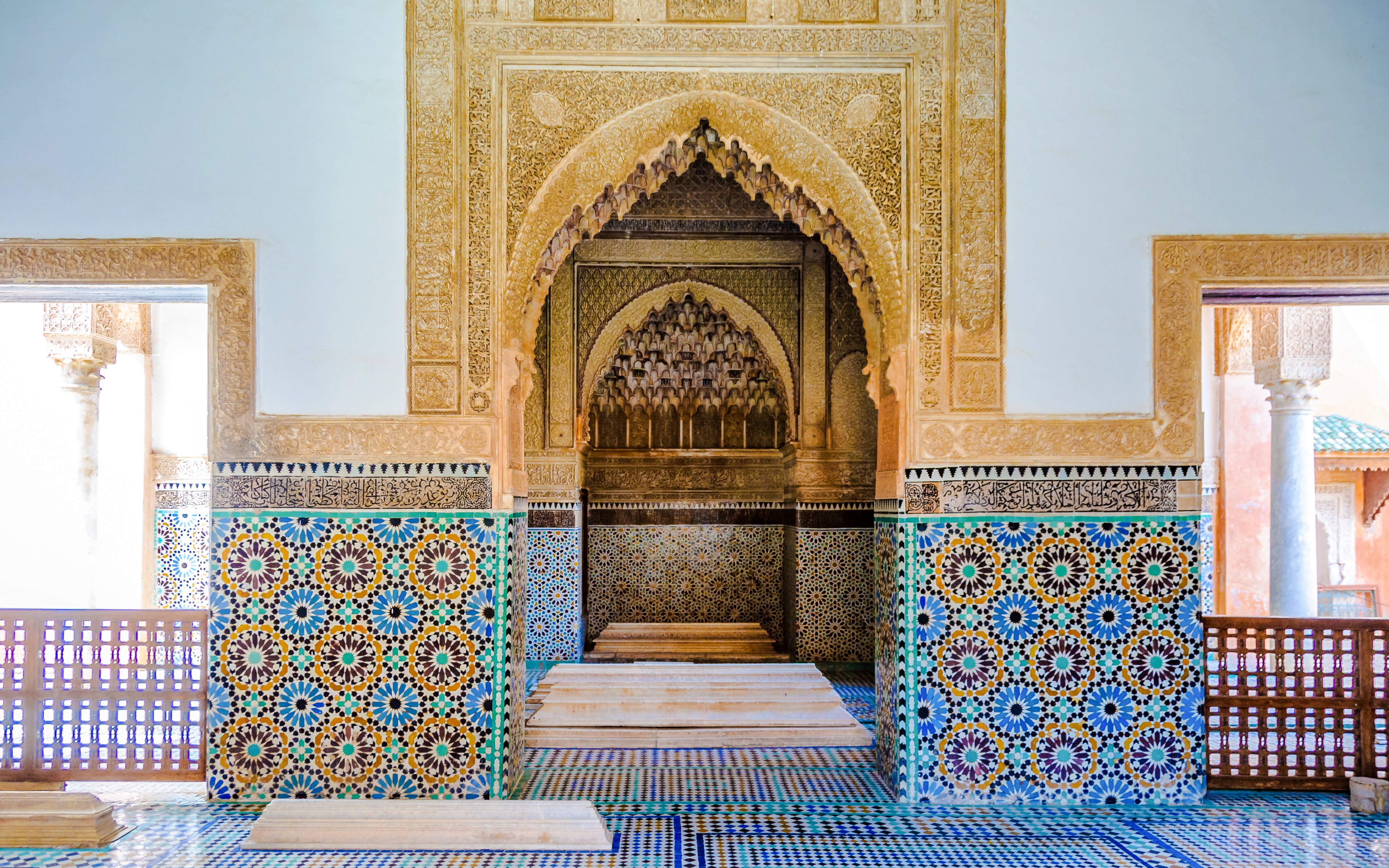 Decorative mosaic tiles and arches in the Saadian Tombs, Marrakech, Morocco.